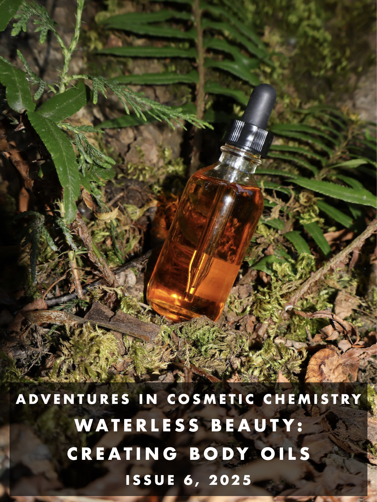 A clear dropper bottle filled with amber liquid cradled by moss, leaves, and ferns.